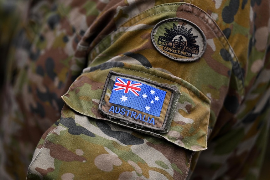an Australian flag pictured on the uniform of Australian Army personnel.