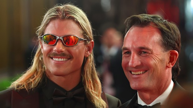 Bailey Smith of the Cats and Andrew Dillon, Chief Executive Officer of the AFL are seen during the 2025 Brownlow Medal 