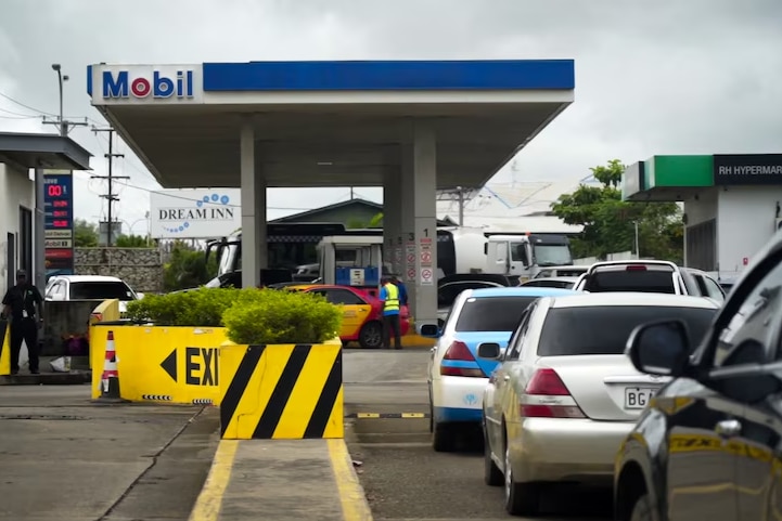 Cars queued up for fuel at a Mobil petrol station in Port Moresby