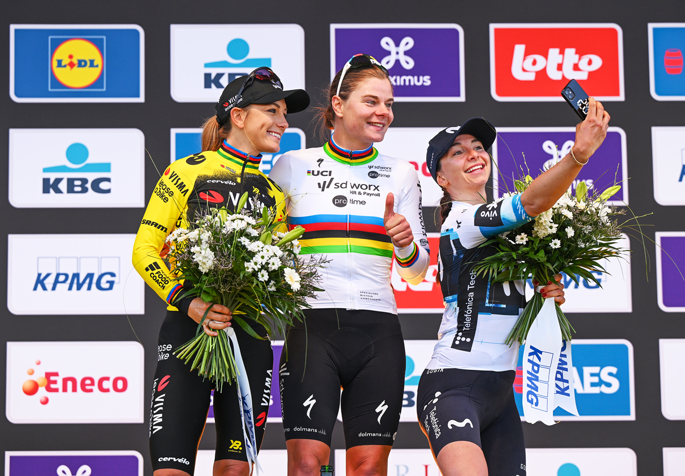 OUDENAARDE, BELGIUM - APRIL 06: (L-R) Pauline Ferrand Prevot of France and Team Visma | Lease a Bike on second place, race winner Lotte Kopecky of Belgium and Team SD Worx - Protime and Liane Lippert of Germany and Movistar Team on third place pose for a photograph on the podium ceremony after the 22nd Ronde van Vlaanderen - Tour des Flandres 2025 - Women's Elite a 168.9km one day race from Oudenaarde to Oudenaarde / #UCIWWT / on April 06, 2025 in Oudenaarde, Belgium. (Photo by Dario Belingheri/Getty Images)