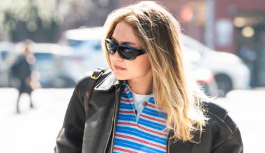 Gigi Hadid wore the rugby shirt trend with a leather bomber jacket and straight-leg jeans
