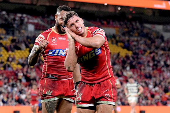 Jake Averillo of the Dolphins plays up for the cameras after crossing the line against the Cowboys in July 2025.