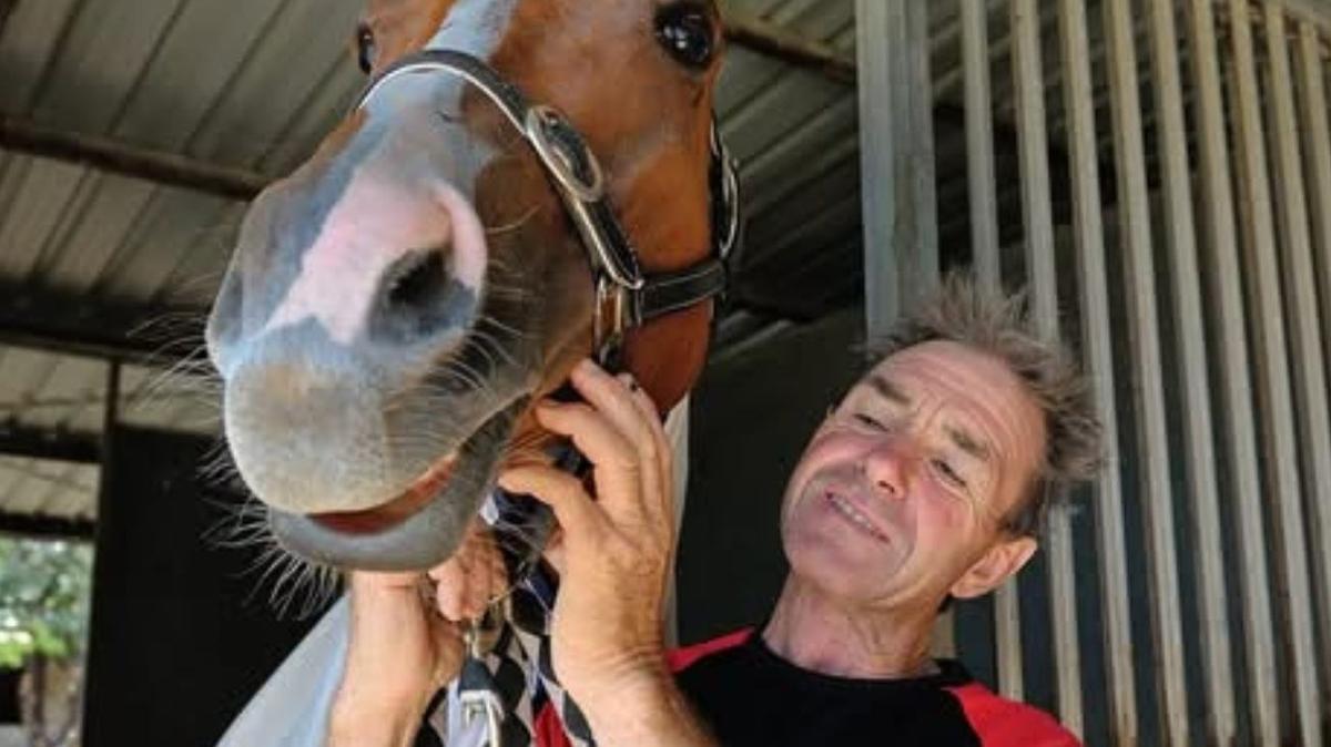 Much-loved Queensland jockey Shane McGovern in induced coma after horse falls and crushes his legs