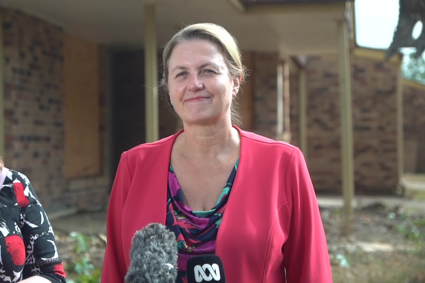 Mayor teresa harding in a pink top