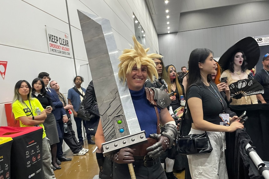 A man cosplaying as Cloud