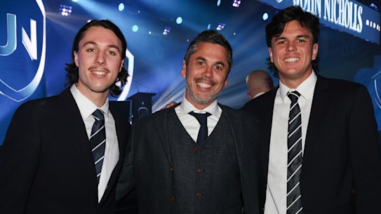 Ben Hollands (centre) with his sons Ollie (left) and Elijah (right).