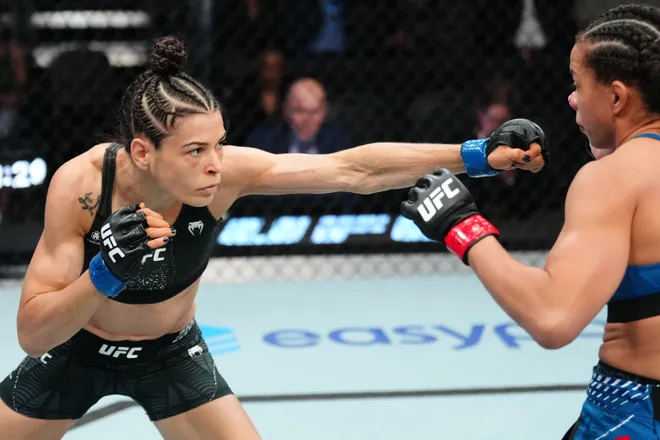LAS VEGAS, NEVADA - APRIL 04: (L-R) Melissa Gatto of Brazil punches Dione Barbosa of Brazil in a flyweight fight during the UFC Fight Night event at Meta APEX on April 04, 2026 in Las Vegas, Nevada. (Photo by Jeff Bottari/Zuffa LLC)