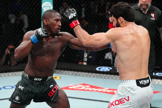 LAS VEGAS, NEVADA - APRIL 04: (L-R) Tresean Gore punches Azamat Bekoev of Russia in a middleweight fight during the UFC Fight Night event at Meta APEX on April 04, 2026 in Las Vegas, Nevada. (Photo by Jeff Bottari/Zuffa LLC)