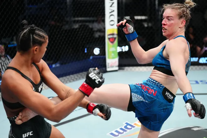 LAS VEGAS, NEVADA - APRIL 04: (R-L) Hailey Cowan kicks Alice Pereira of Brazil in a bantamweight fight during the UFC Fight Night event at Meta APEX on April 04, 2026 in Las Vegas, Nevada. (Photo by Jeff Bottari/Zuffa LLC)