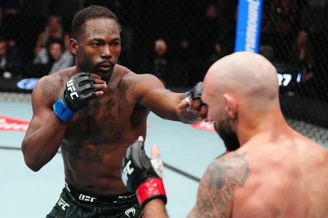 LAS VEGAS, NEVADA - APRIL 04: (L-R) Darrius Flowers punches Lando Vannata in a lightweight fight during the UFC Fight Night event at Meta APEX on April 04, 2026 in Las Vegas, Nevada. (Photo by Jeff Bottari/Zuffa LLC)