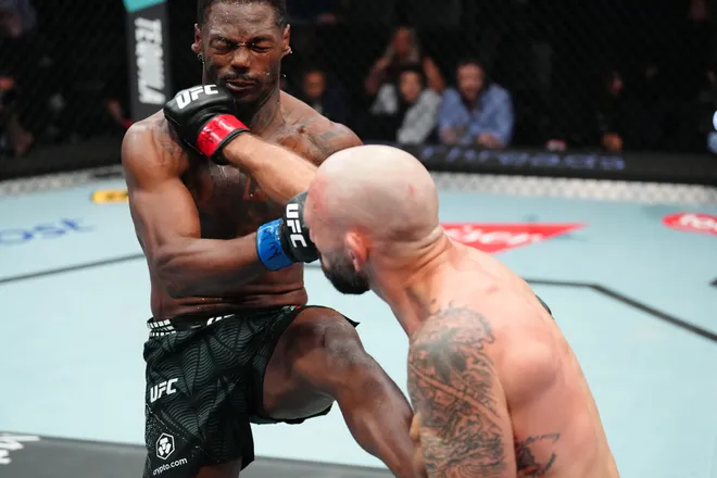 LAS VEGAS, NEVADA - APRIL 04: (R-L) Lando Vannata punches Darrius Flowers in a lightweight fight during the UFC Fight Night event at Meta APEX on April 04, 2026 in Las Vegas, Nevada. (Photo by Jeff Bottari/Zuffa LLC)