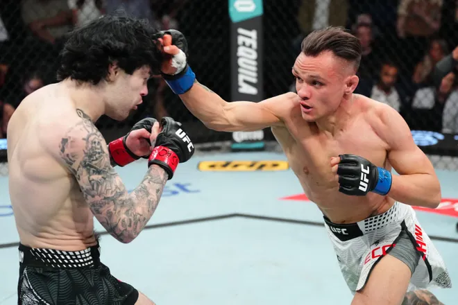 LAS VEGAS, NEVADA - APRIL 04: (R-L) Manolo Zecchini of Italy punches Tommy McMillen in a featherweight fight during the UFC Fight Night event at Meta APEX on April 04, 2026 in Las Vegas, Nevada. (Photo by Jeff Bottari/Zuffa LLC)