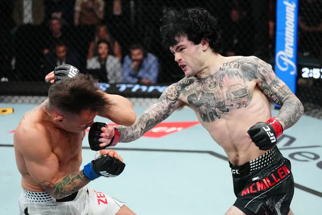 LAS VEGAS, NEVADA - APRIL 04: (R-L) Tommy McMillen punches Manolo Zecchini of Italy in a featherweight fight during the UFC Fight Night event at Meta APEX on April 04, 2026 in Las Vegas, Nevada. (Photo by Jeff Bottari/Zuffa LLC)
