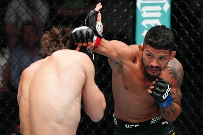 LAS VEGAS, NEVADA - APRIL 04: (R-L) Rafael Estevam of Brazil punches Ethyn Ewing in a bantamweight fight during the UFC Fight Night event at Meta APEX on April 04, 2026 in Las Vegas, Nevada. (Photo by Jeff Bottari/Zuffa LLC)