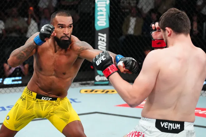 LAS VEGAS, NEVADA - APRIL 04: (L-R) Brendson Ribeiro of Brazil punches Abdul Rakhman Yakhyaev of Russia in a light heavyweight fight during the UFC Fight Night event at Meta APEX on April 04, 2026 in Las Vegas, Nevada. (Photo by Jeff Bottari/Zuffa LLC)