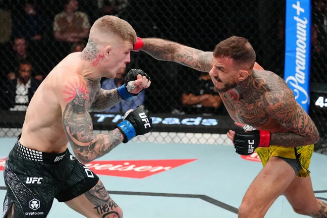 LAS VEGAS, NEVADA - APRIL 04: (R-L) Renato Moicano of Brazil punches Chris Duncan of Scotland in a lightweight fight during the UFC Fight Night event at Meta APEX on April 04, 2026 in Las Vegas, Nevada. (Photo by Jeff Bottari/Zuffa LLC)
