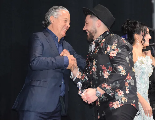 Josh Pereira, of Fall River, receives the IPMA Rock Award from NOS Alive Festival Founder Álvaro Covões.