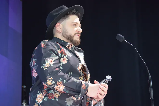 Josh Pereira, of Fall River, accepts the Rock Award at the 2026 International Portuguese Music Awards held at the Providence Performing Arts Center on April 25, 2026.