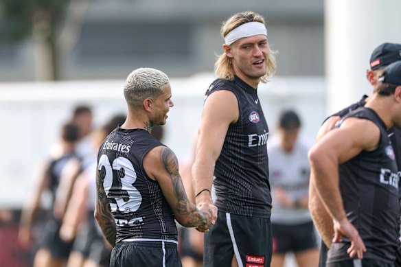 Full of hope: Collingwood captain Darcy Moore says the Magpies still have time to launch a premiership tilt, but they will need Bobby Hill to help address their forward woes.