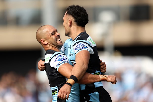 SYDNEY, AUSTRALIA - APRIL 05: William Kennedy of the Sharks celebrates with team mates after scoring a try during the round five NRL match between the Cronulla Sharks and New Zealand Warriors at Ocean Protect Stadium on April 05, 2026 in Sydney, Australia. (Photo by Matt Blyth/Getty Images)