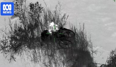 Cyclist rescued by Victoria Police Air Wing, after trying to ride across the Snowy River at Suggan Buggan