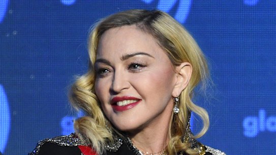 Madonna has been accused of false advertising by two people who attended her December concert in New York.