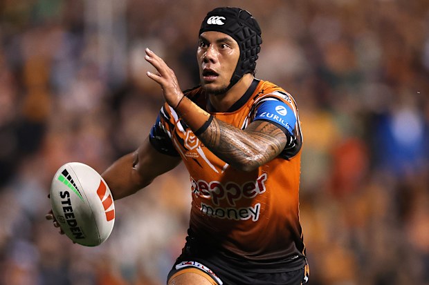 SYDNEY, AUSTRALIA - APRIL 23: Jarome Luai of the Wests Tigers runs the ball during the round eight NRL match between the Wests Tigers and Canberra Raiders at Leichhardt Oval on April 23, 2026 in Sydney, Australia. (Photo by Cameron Spencer/Getty Images)