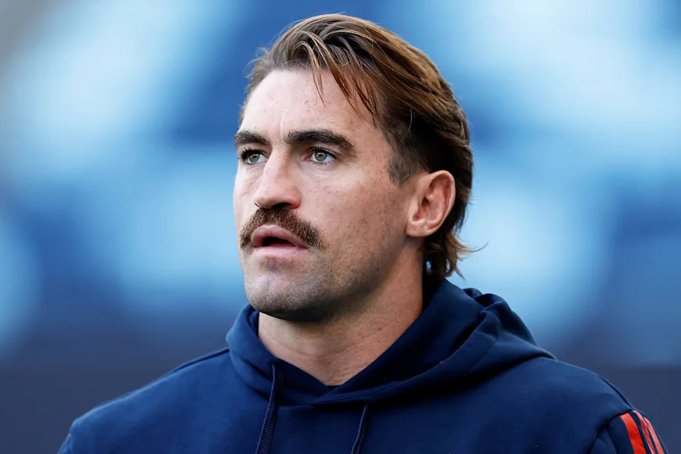 Connor Watson looks on before a game.