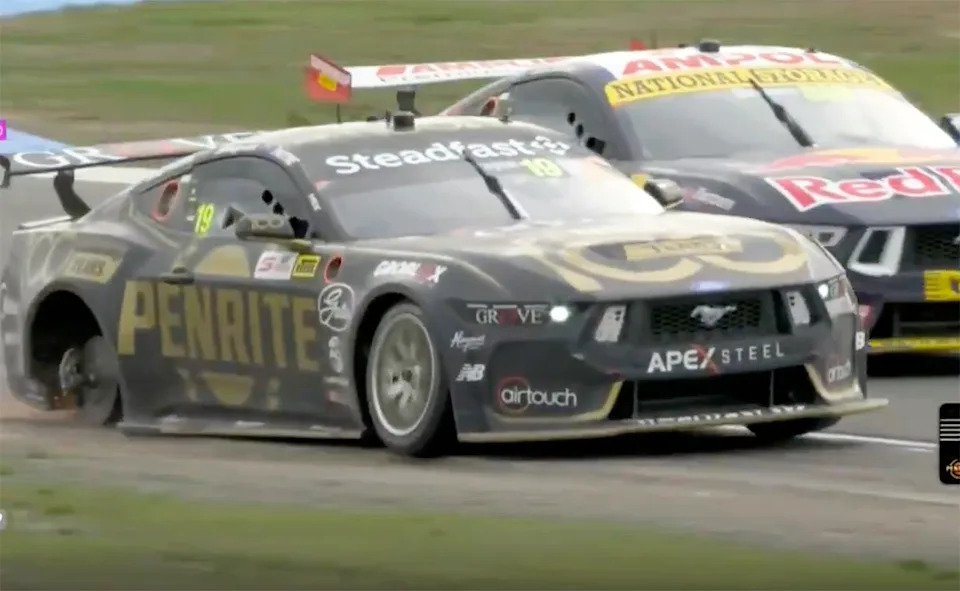 Matt Payne with his right rear wheel missing.