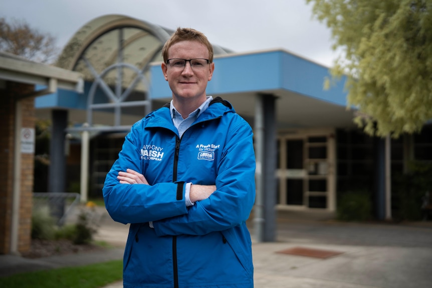 Anthony Marsh wers a blue jacket and looks at the camera.