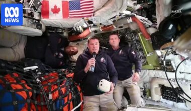 Artemis II crew work inside space capsule on historic lunar mission