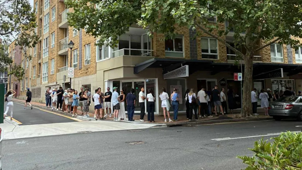 A large queue for a rental property on Campbell Street, Surry Hills.