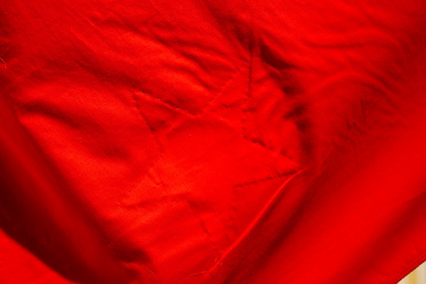 A close up of the flag fabric with star symbol embossed