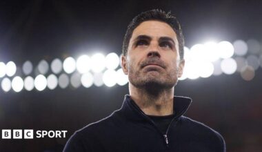 Mikel Arteta with lights behind him