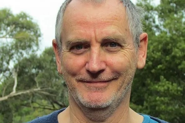  headshot of Charles Darwin University ecologist and Biodiversity Council Australia member Professor John Woinarski