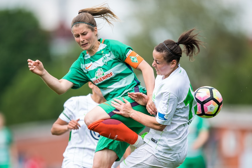 Marie-Louise Eta challenges for the ball