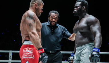 Anatoly Malykhin and "Reug Reug" Oumar Kane listen to Herb Dean before their MMA World Title fight