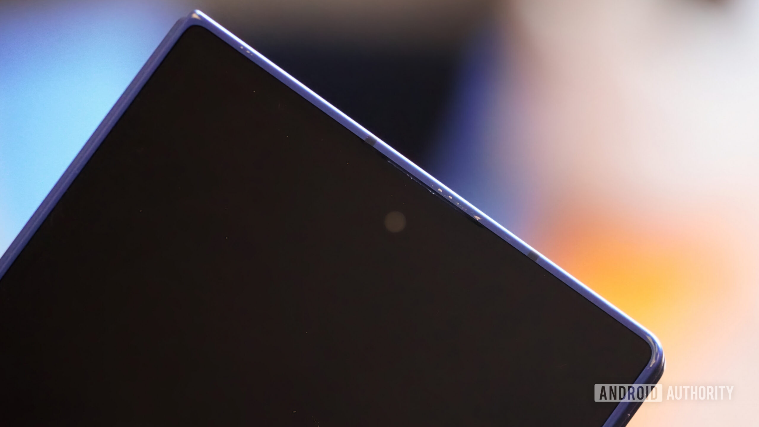 Scratches along the top of a blue Galaxy Z Fold 7.