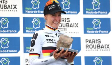 Franziska Koch of Germany and Team FDJ United - SUEZ celebrates at podium as race winner with the cobblestone-race-trophy
