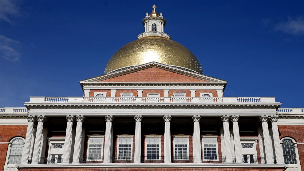 A large brick building with a golden dome.
