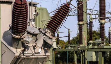 An electrical transformer connects to the grid.