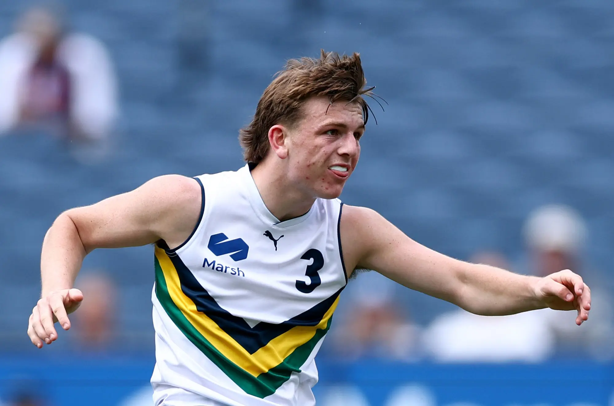 MELBOURNE, AUSTRALIA - SEPTEMBER 27: Arki Butler of Team Boak kicks during the Marsh AFL National Futures Boys match between Team Boak and Team Docherty at Melbourne Cricket Ground, on September 27, 2025 in Melbourne, Australia. (Photo by Josh Chadwick/AFL Photos/via Getty Images)
