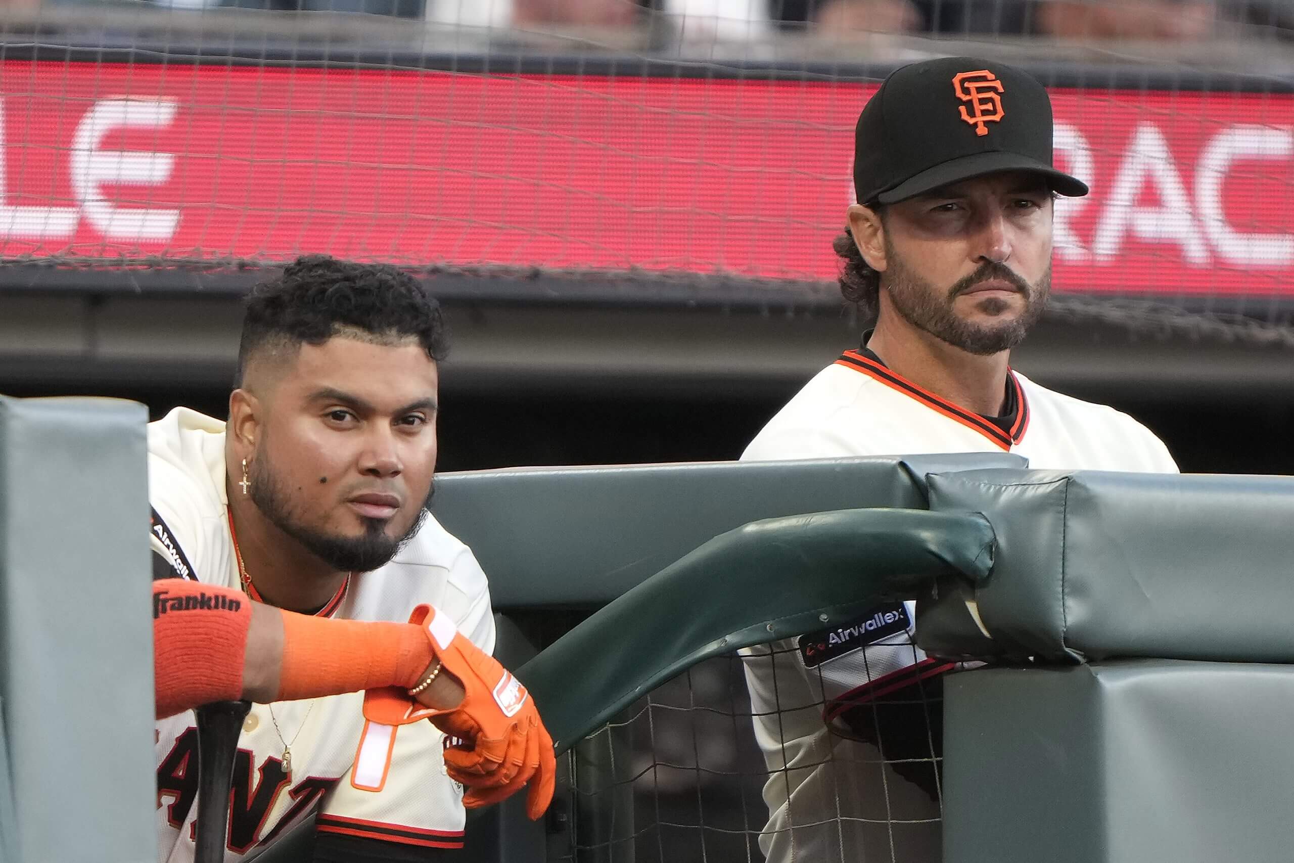 Luis Arraez #1 and manager Tony Vitello of the San Francisco Giants look on against the New York Yankees during the fifth inning on Opening Day at Oracle Park on March 25, 2026 in San Francisco, California. 