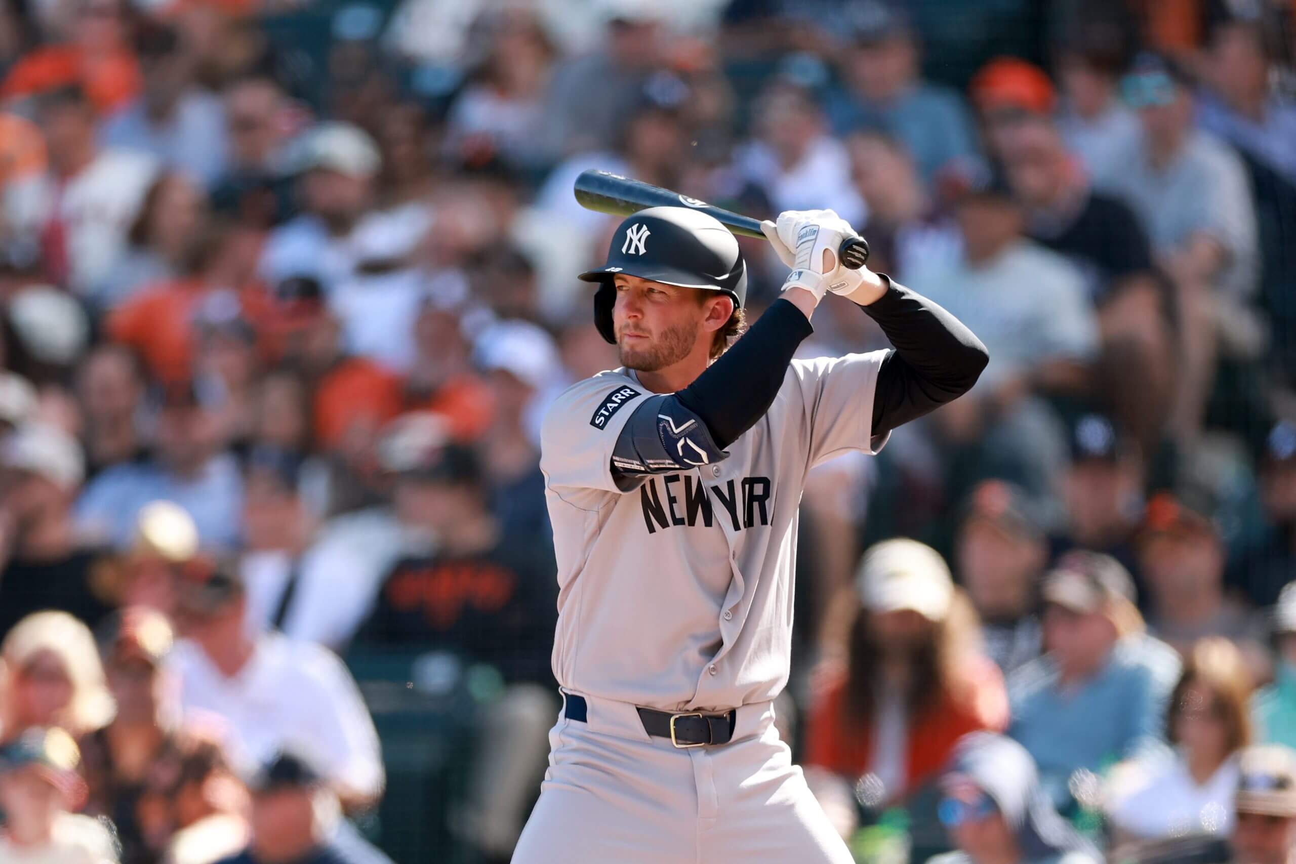 Ryan McMahon bats against the Giants at Oracle Park. 