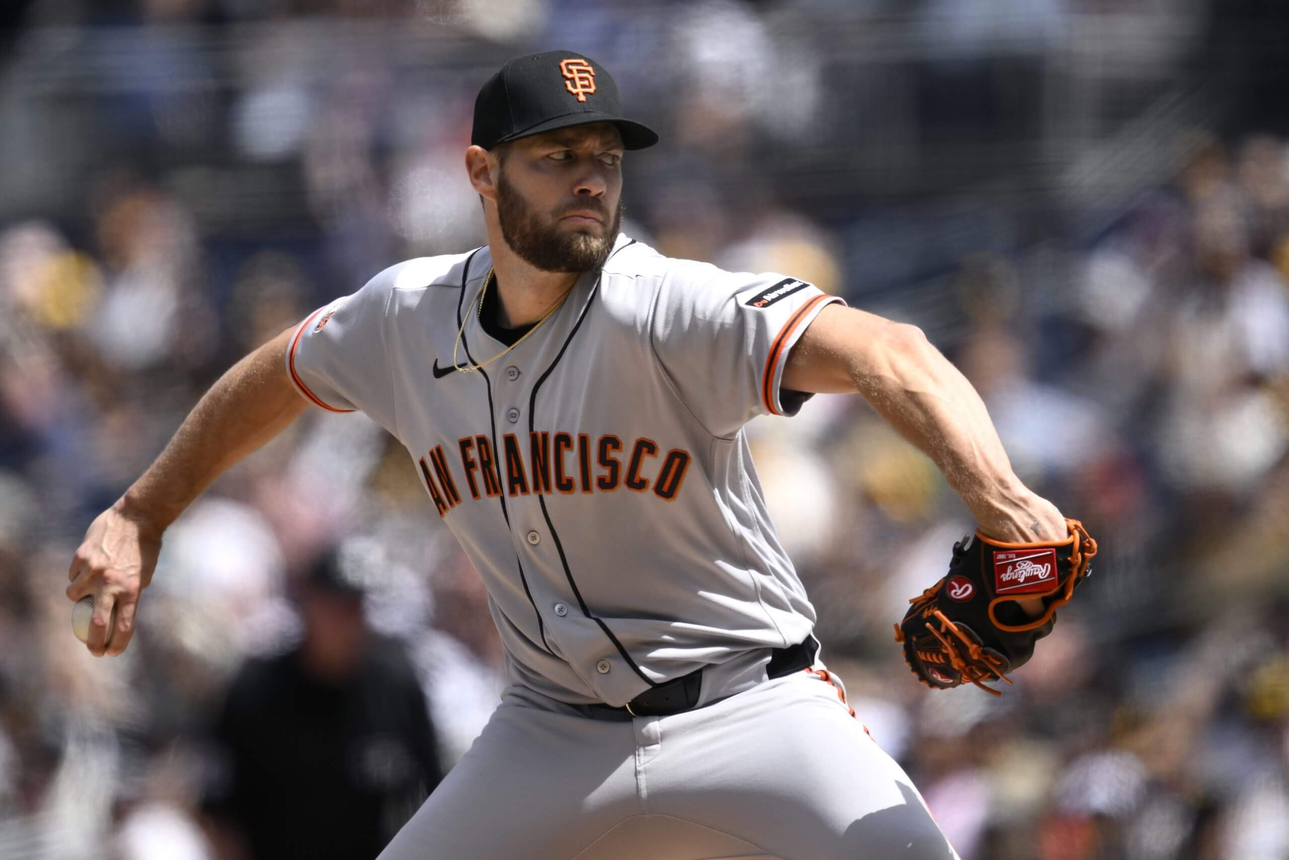 Adrian Houser #12 of the San Francisco Giants pitches against the San Diego Padres during the first inning at Petco Park on April 01, 2026 in San Diego, California.