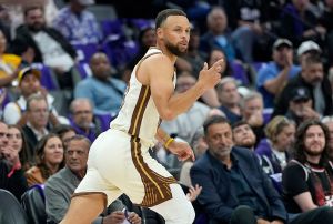SACRAMENTO, CALIFORNIA - APRIL 10: Stephen Curry #30 of the Golden State Warriors reacts after making a three-point shot over Precious Achiuwa #9 of the Sacramento Kings in the first half at Golden 1 Center on April 10, 2026 in Sacramento, California. NOTE TO USER: User expressly acknowledges and agrees that, by downloading and or using this photograph, User is consenting to the terms and conditions of the Getty Images License Agreement. (Photo by Thearon W. Henderson/Getty Images)