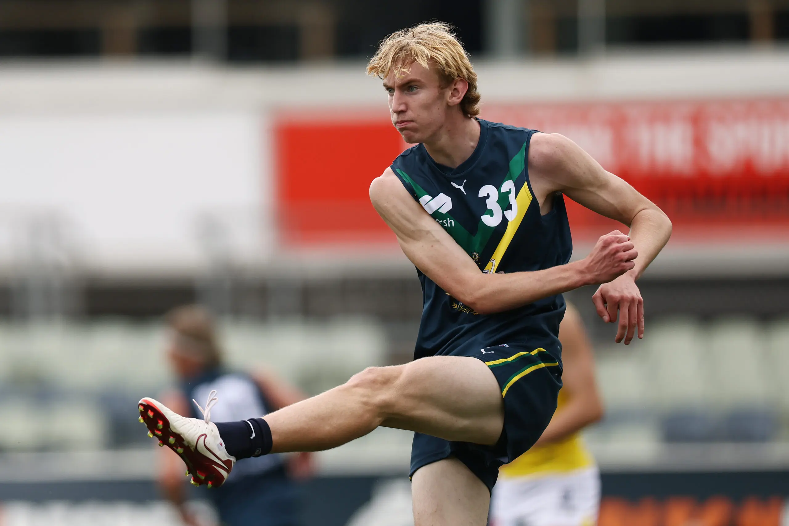 MELBOURNE, AUSTRALIA - APRIL 18: Xavier Ladbrook of the AFL National Academy kicks the ball during the Marsh AFL National Academy Boys match between Australia U18 and Richmond VFL at Ikon Park on April 18, 2026 in Melbourne, Australia. (Photo by Morgan Hancock/AFL Photos/via Getty Images)