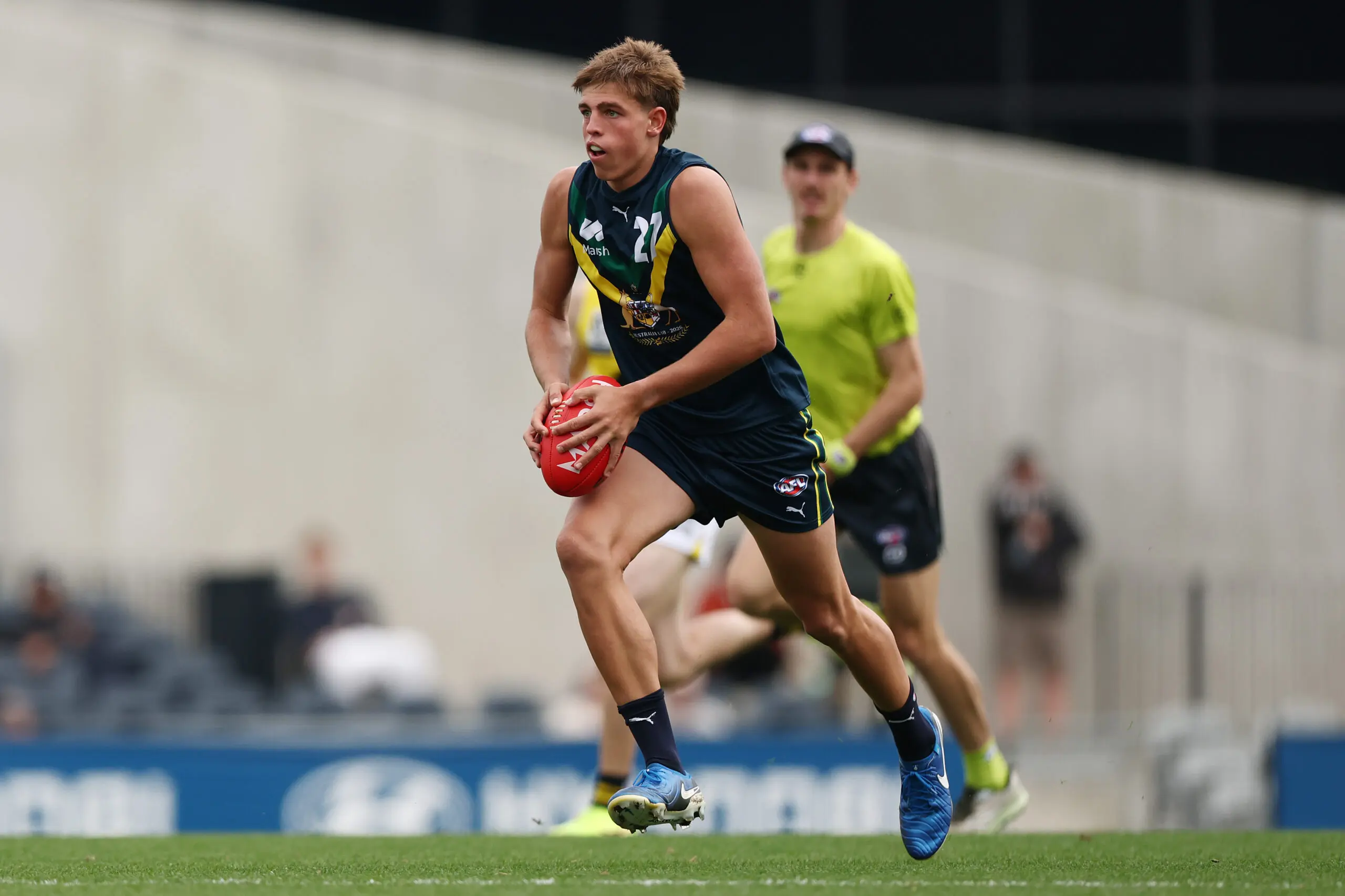 MELBOURNE, AUSTRALIA - APRIL 18: Koby LeCras of the AFL National Academy takes possession of the ball during the Marsh AFL National Academy Boys match between Australia U18 and Richmond VFL at Ikon Park on April 18, 2026 in Melbourne, Australia. (Photo by Morgan Hancock/AFL Photos/via Getty Images)