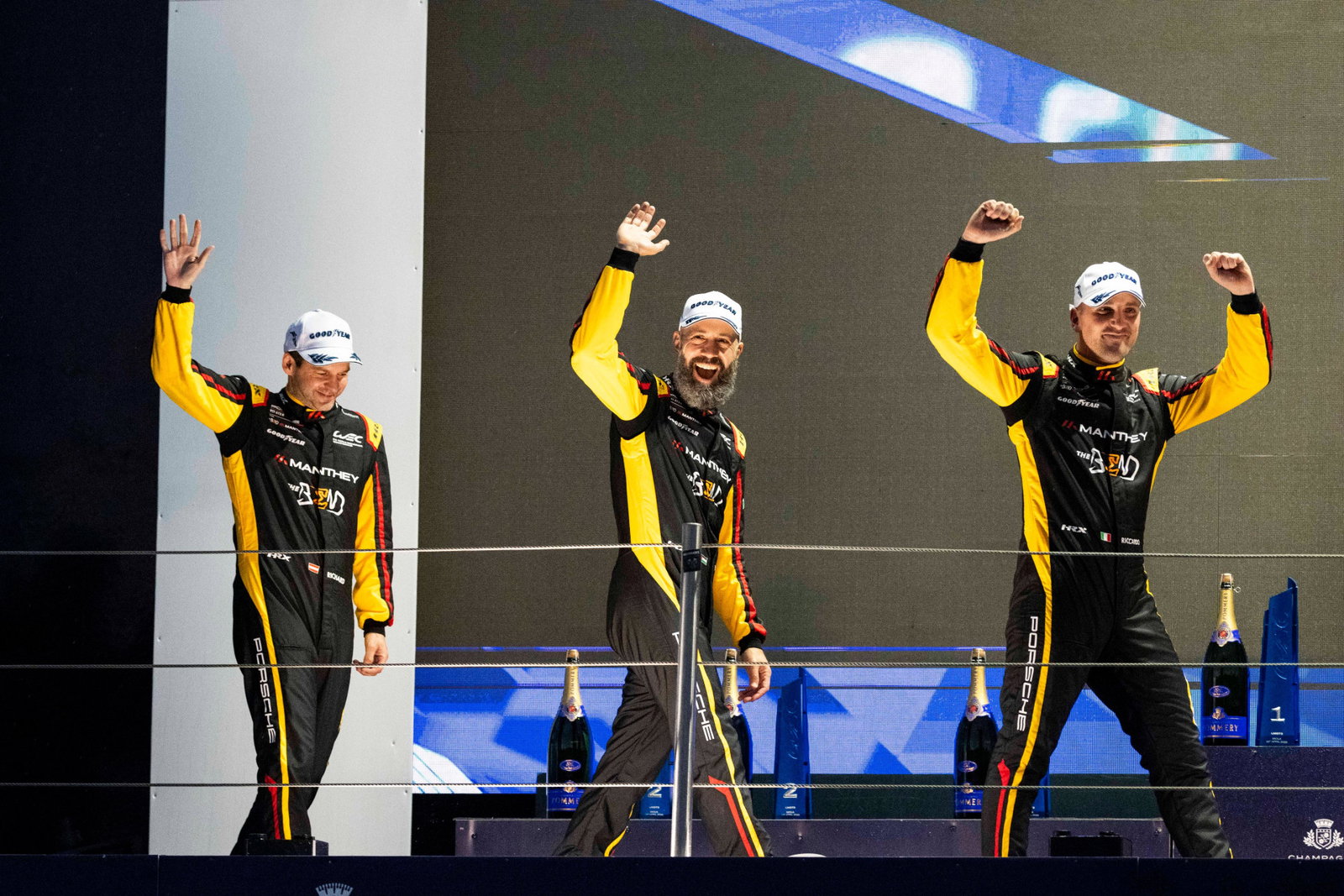 Yasser Shahin (middle) on the podium with his Manthey Racing teammates at the FIA World Endurance Championship 6 Hours of Imola.
