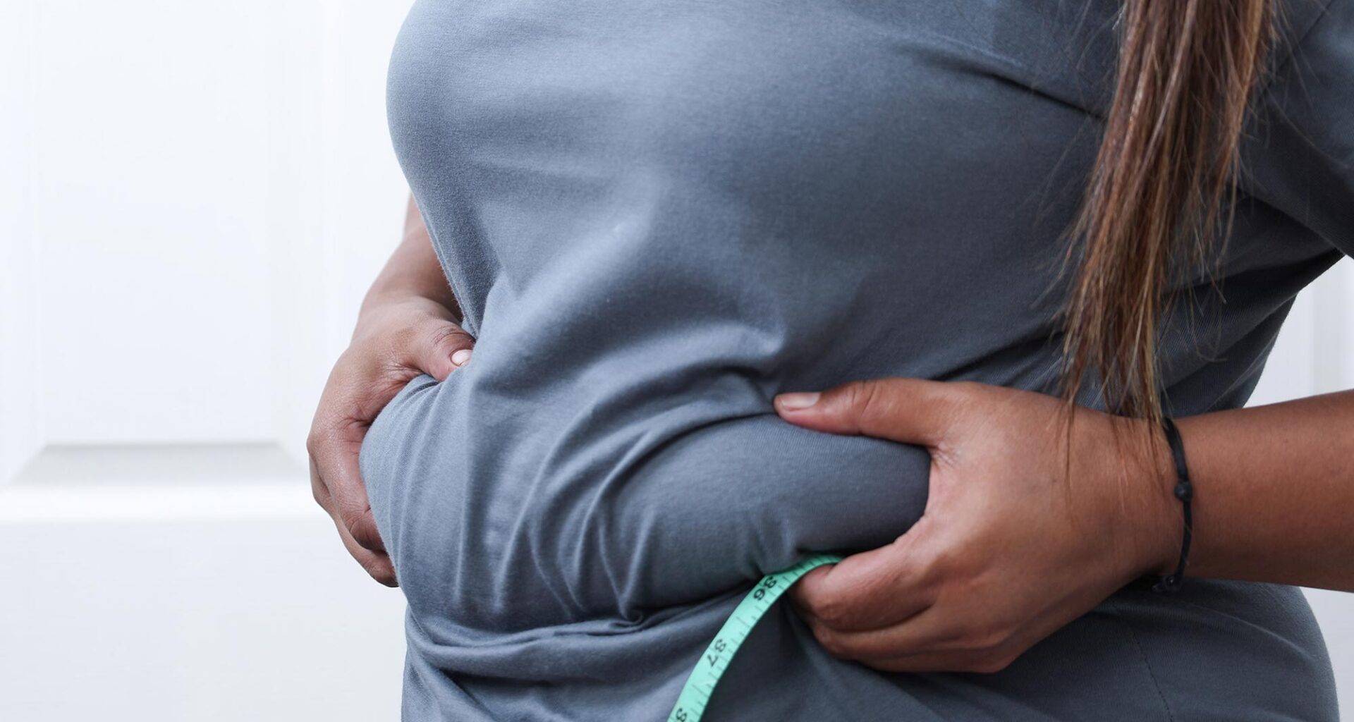 Heavy Overweight Woman Pinching Belly Fat